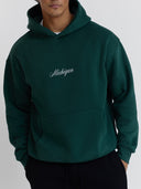 detail of michigan script hoodie green one dna brand