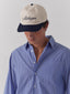 Hat with Michigan in cursive font by ONE DNA