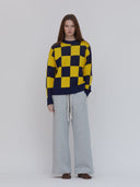navy and yellow checkerboard sweater one dna
