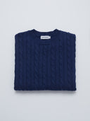 navy cable knit sweater folded