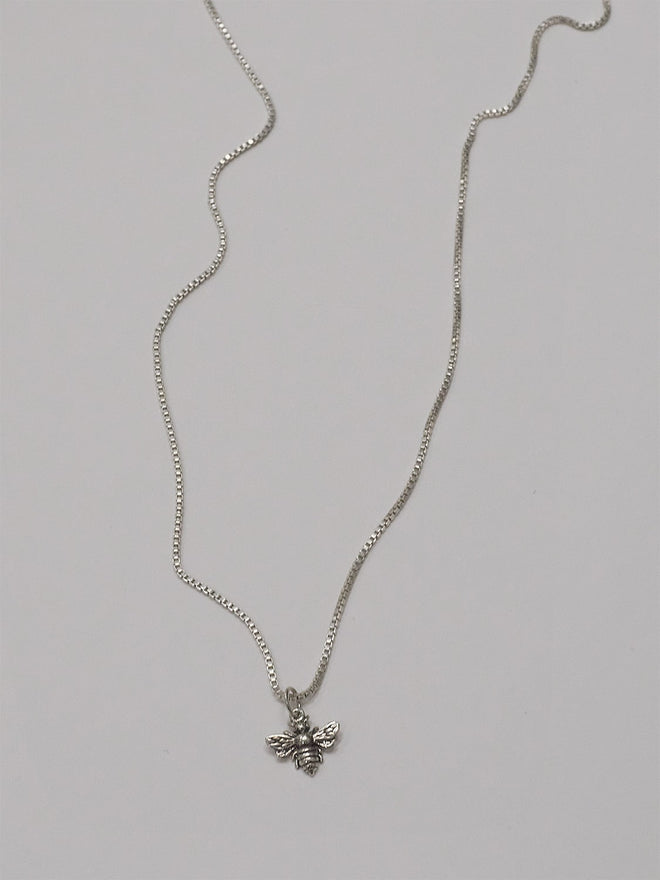 necklace with bee pendant