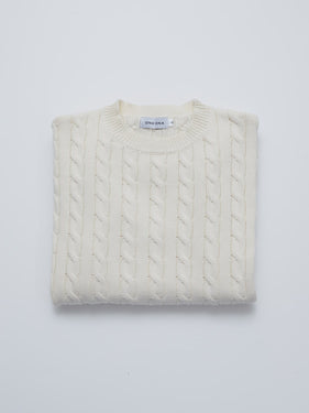 off white cable knit sweater folded