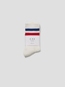 Three-Stripe Calf Rugby Socks Navy & Red folded in paper wrap