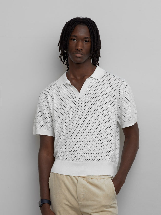 white knitted polo