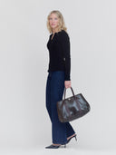 women's ribbed henley styled with leather shoes and leather bag